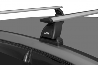 Багажник на крышу LUX, крепление за С-рельс для Volkswagen Transporter (T6) минивен 2016- (БКШМ+дуги аэро-трэвэл 1,4м+БКШМ LUX 911) от магазина ФаркопРос